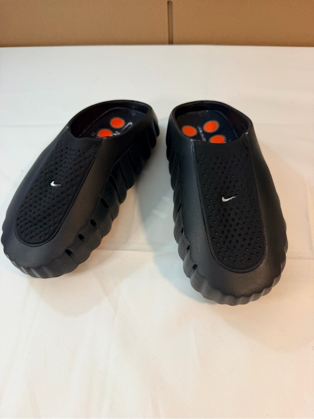 Nike Black Slip-On Casual Flats with Orange Insole Accents